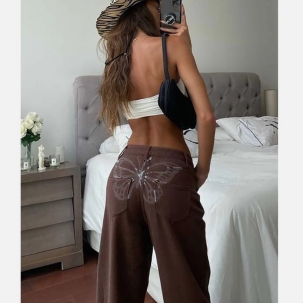 TIGERMIST BROWN BUTTERFLY JEANS. WORN ONCE.